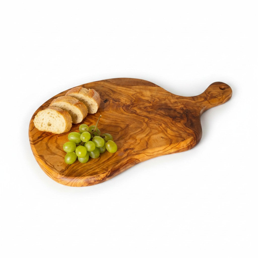 Handmade round freeform olive wood serving board with warm brown finish and bold swirling grain perfect for cheese and antipasti