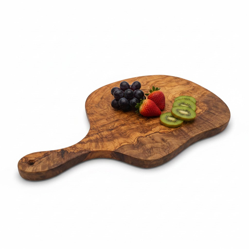 Handmade round freeform olive wood cutting board with bold natural grain perfect for cheese and antipasti serving