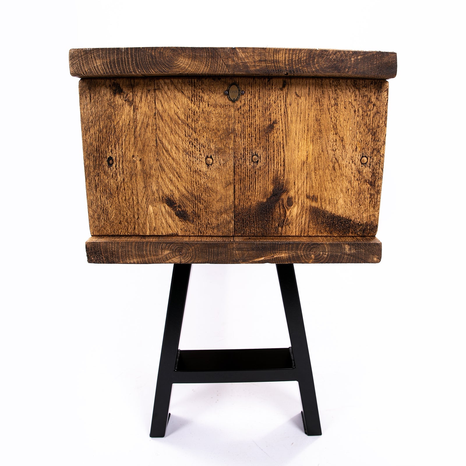 Handmade rustic tv stand with dark brown weathered wooden chest and black metal legs for a cozy living room setup
