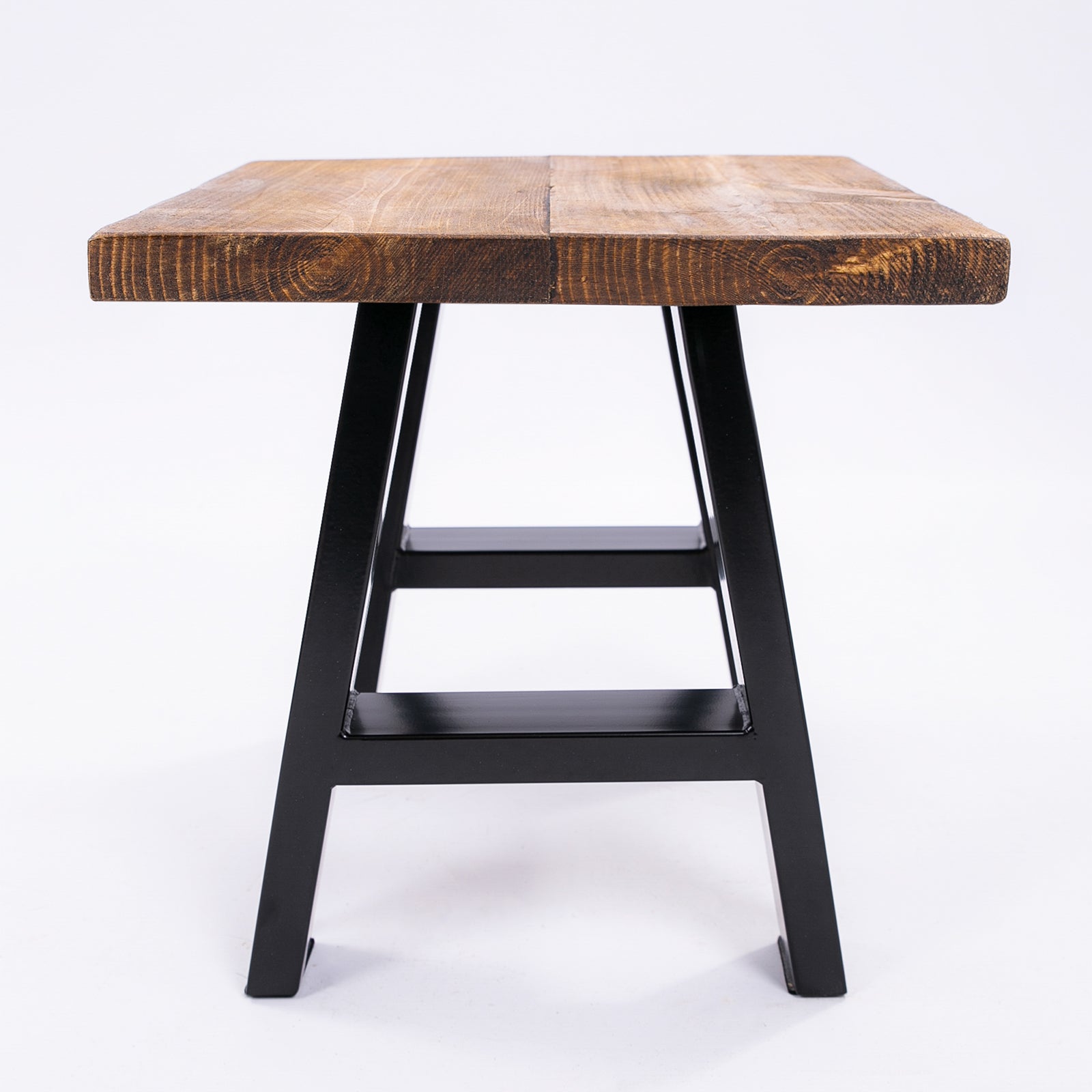 Handmade solid wooden stool with a rustic wooden top black steel legs and a lower shelf for extra storage