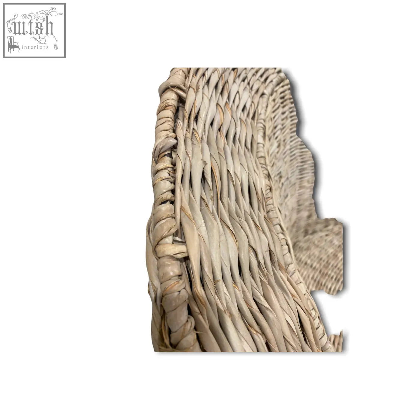 Beige woven wicker palm leaf chair with textured interlaced pattern and braided edge from mozambique