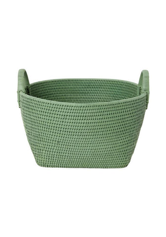 A sage green handy handwoven rattan basket with two integrated handles perfect for storage and organization