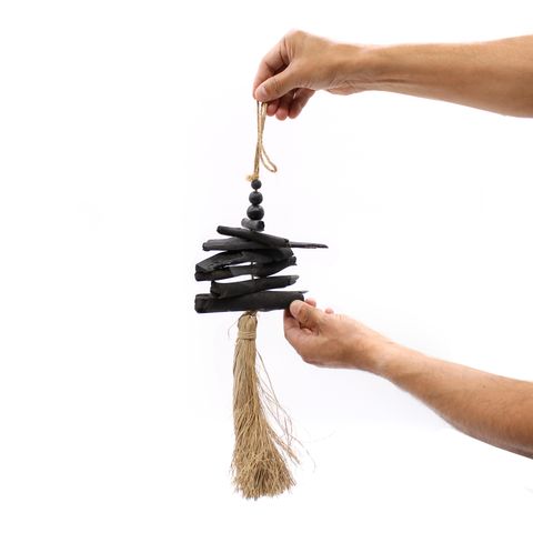Black wooden hanging driftwood tassel wind chime with natural fiber tassel and beaded top 42cm
