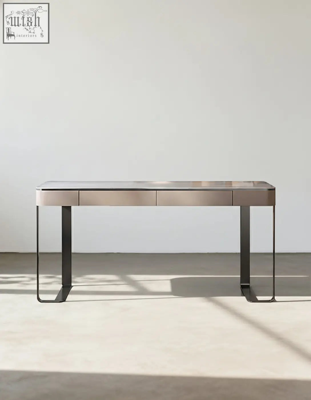 Minimalist office desk with brushed metal top and black steel legs featuring two drawers for a functional office desk setup