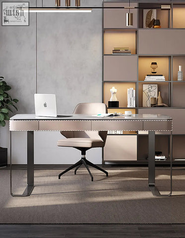 Modern minimalist hanna office desk with light gray sintered stone top and dark metal legs with nailhead trim