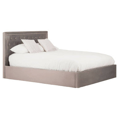 Hannah grey ottoman king bed with gray upholstered tufted headboard and white bedding in a bedroom setting