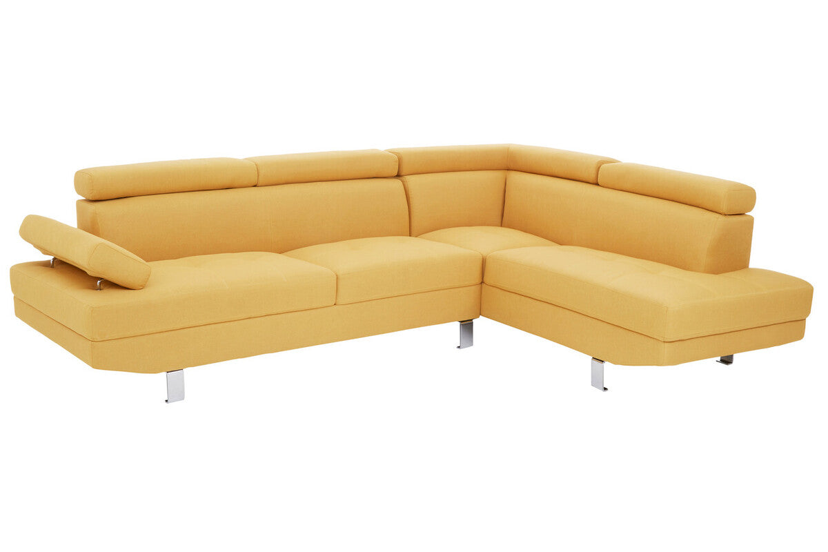 Modern mustard-yellow sectional sofa with sleek chrome legs and segmented cushioning in ochre linen fabric
