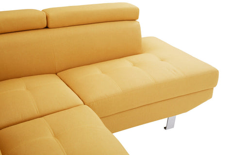 Yellow tufted ochre linen corner sofa with sleek chrome legs perfect for modern living rooms