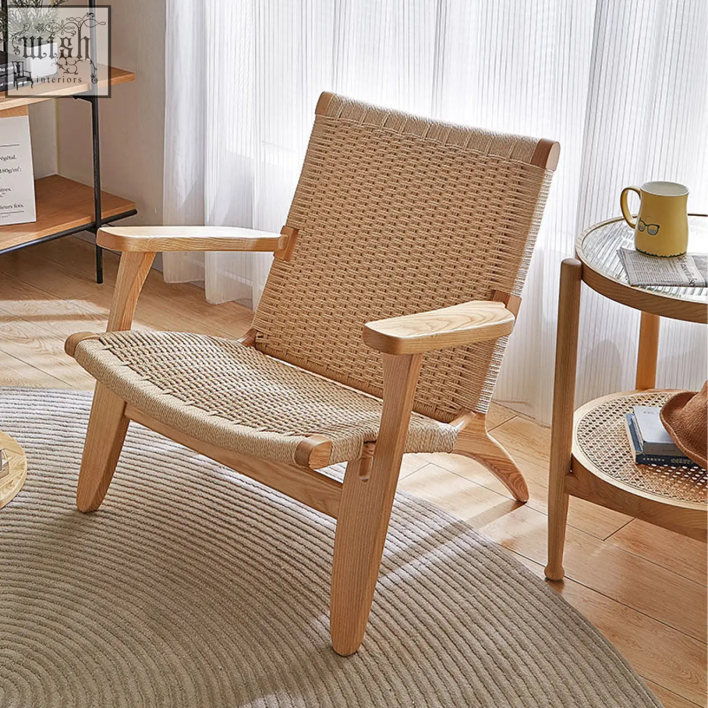 Hans ch25 oak armchair with oiled oak frame and woven natural fiber seat and backrest designed for lounging