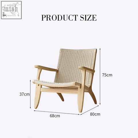 A hans ch25 oak armchair with oiled oak frame and natural woven cord seat and back designed for lounge comfort