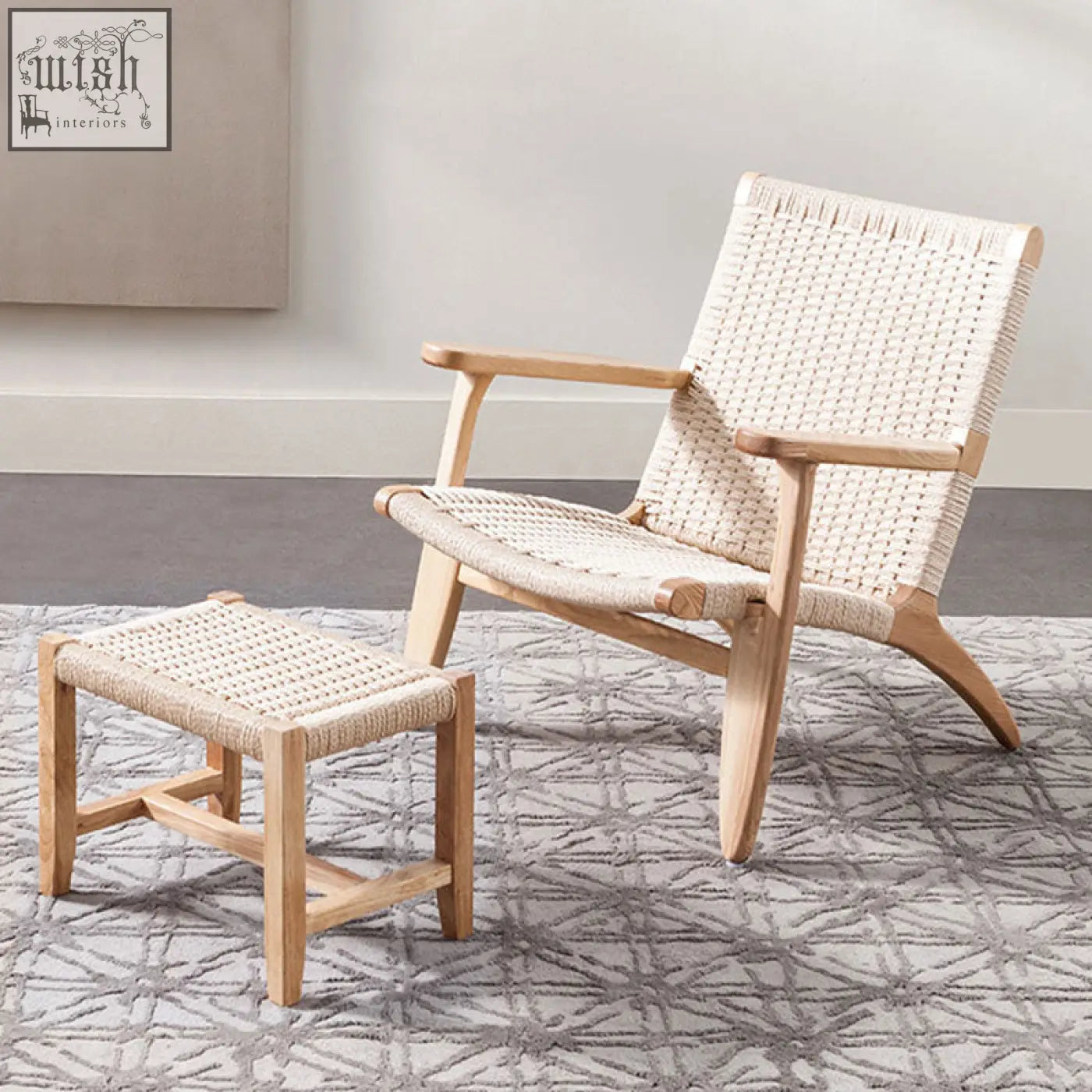 Light wood-framed ch25 oak armchair with woven natural cord seat and matching footstool in oiled oak finish