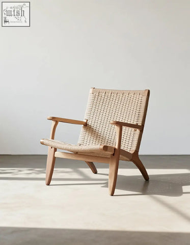 Hans ch25 oak armchair designed with oiled oak frame and natural woven cord seat and backrest in beige