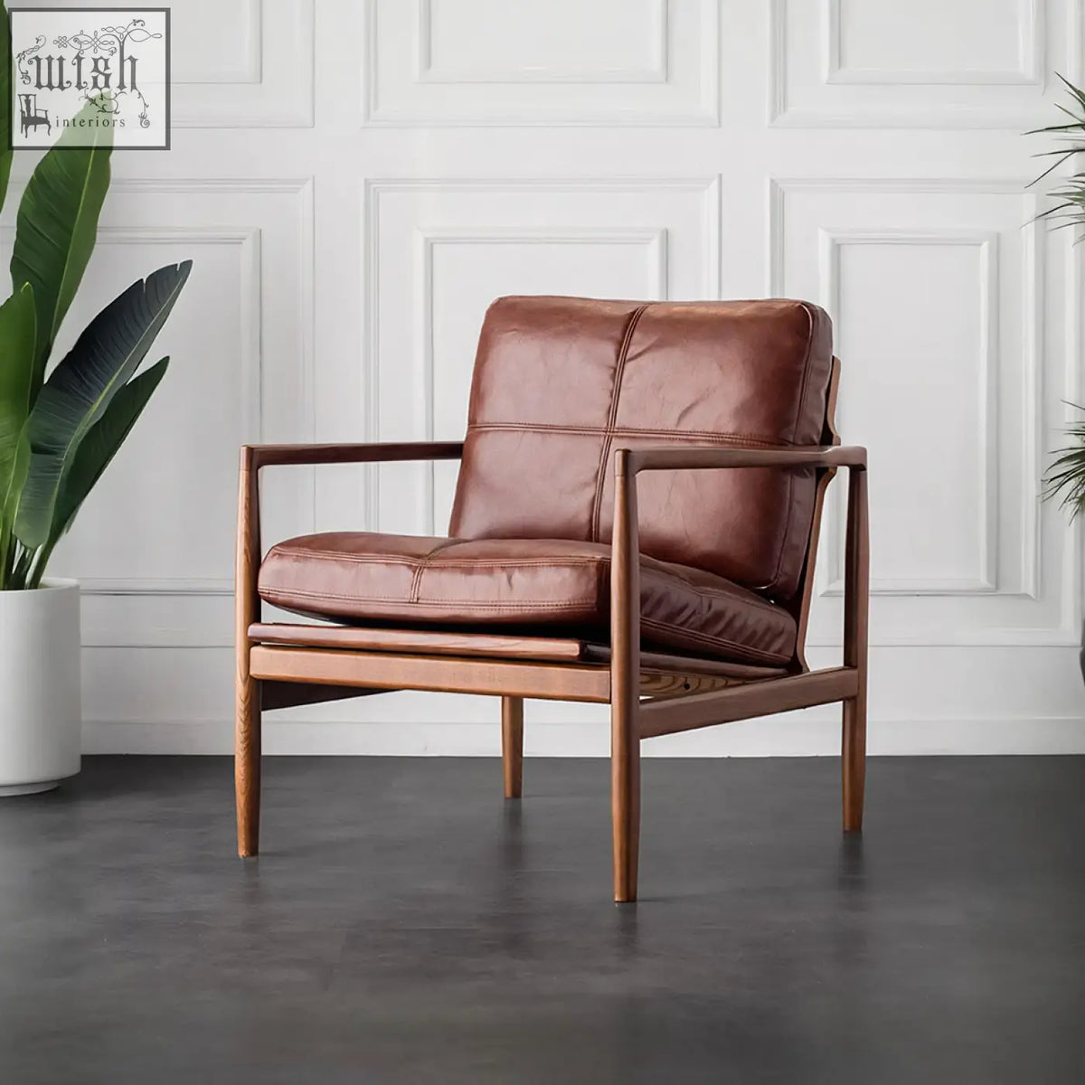 Brown leather hans wegner ch2 armchair with wooden frame combining style and comfort in ch2 stylish armchair design