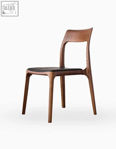 Modern hans wegner ch3 dining chair in dark oak with a sleek wooden frame and black upholstered seat for dining rooms