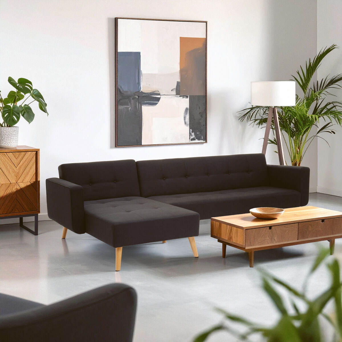 Black tufted hansa hagen black linen corner sofa bed with light wood legs perfect for lounging and sleeping