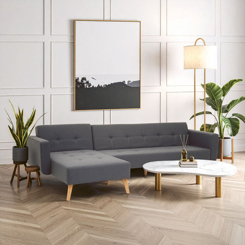 Modern grey linen corner sofa bed with tufted cushions and wooden legs from hansa hagen collection
