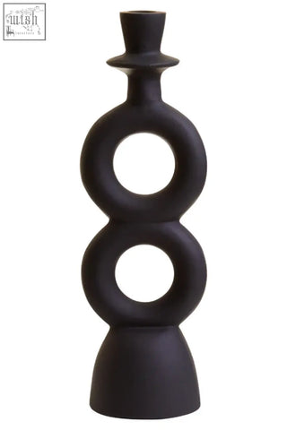Hapax large black candle holder with matte black ceramic stacked rings and top hat finial design