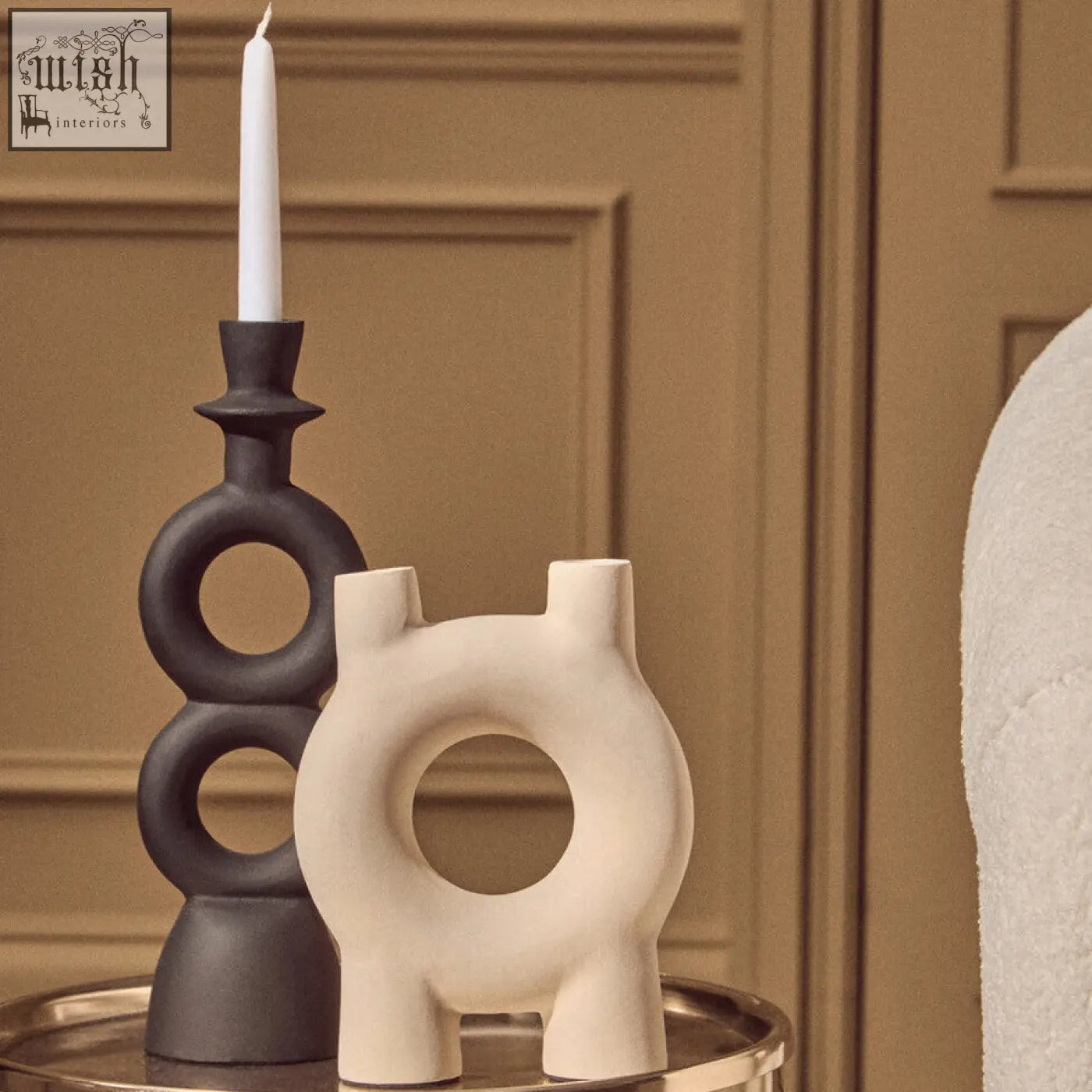 Large black candle holder made of matte black ceramic with a unique circular ring design for stylish decor