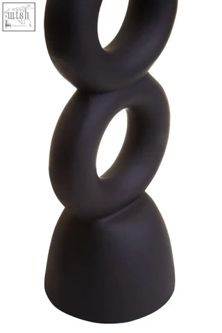 Black matte ceramic candle holder with three stacked rings ideal for large black candle display