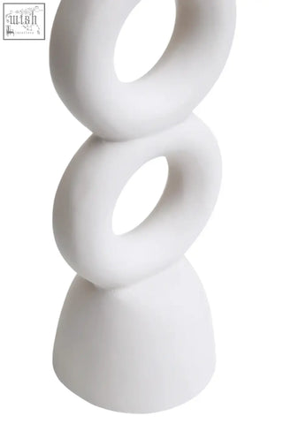 White ceramic abstract sculpture candle holder with three stacked rings in cream for large cream candle holder use
