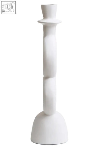 White ceramic candle holder with a tapered segmented body and flared base for large cream candle display