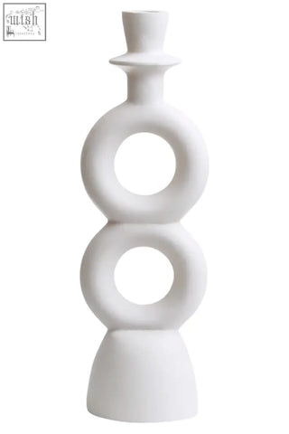 White ceramic candle holder with stacked circular rings and tapered top perfect for large cream candle holder