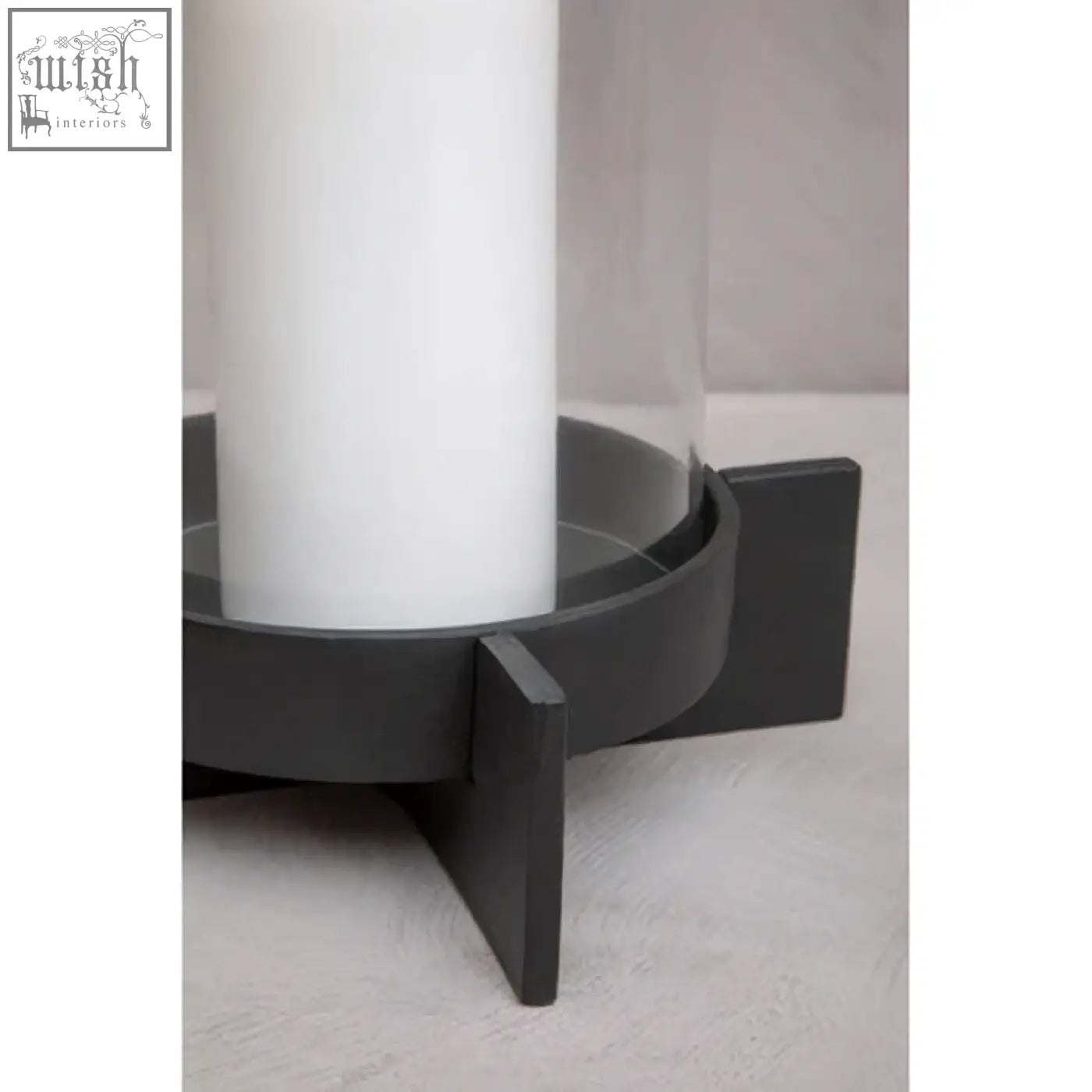 Hapax large matt black finish candle holder with sleek black finish candle design and three angular metal legs