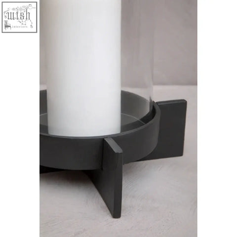 Hapax large matt black finish candle holder with sleek black finish candle design and three angular metal legs