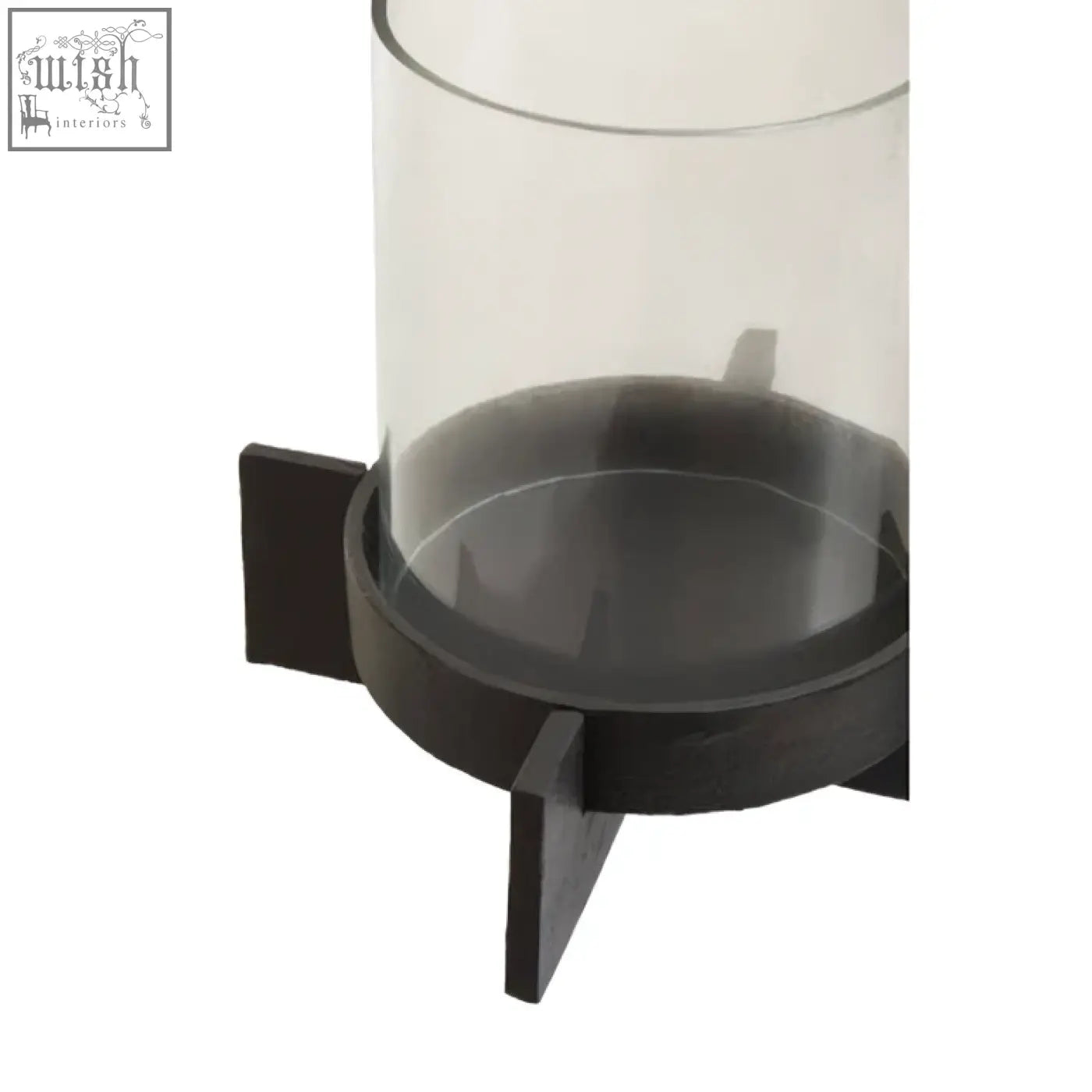 Clear cylindrical bird feeder with black finish candle holder base and three feet for stable placement
