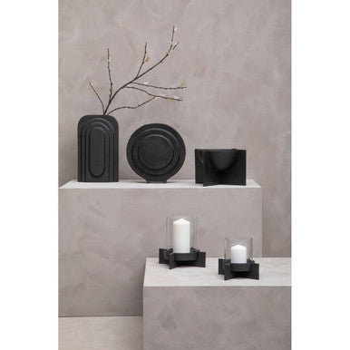 Small matt black ceramic vases with minimalist geometric designs matching the hapax matt black finish candle holder