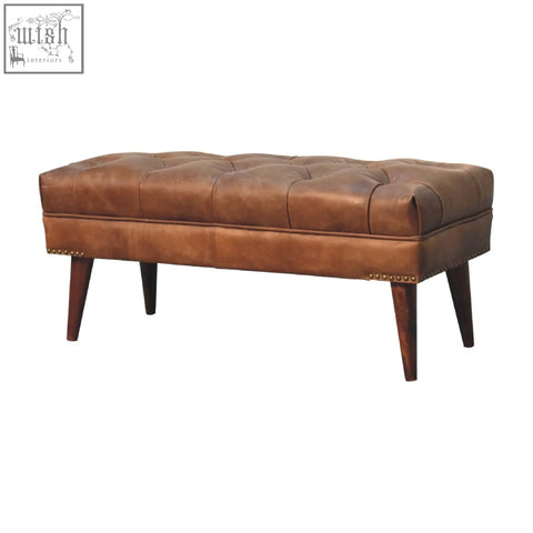 Harbour brown leather bench with tufted brown leather seat, mango wood legs, and brass nailhead trim in chestnut color