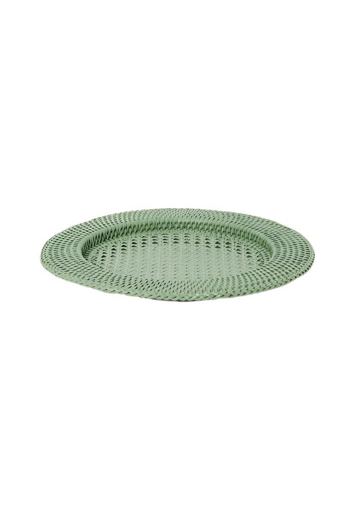 A mint green woven placemat with a textured interlaced pattern from harbour island round rattan charger set of 4