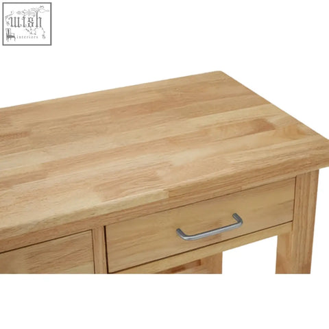 Light oak hevea wood kitchen trolley with a single drawer and sleek silver metal handle from harlow glenn