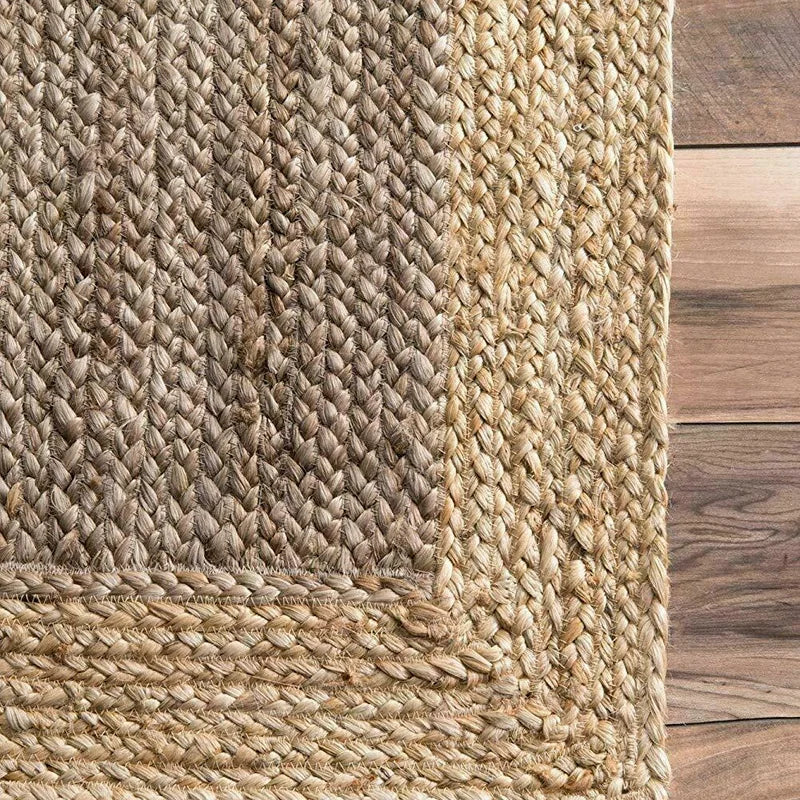 Natural fiber woven harue rug with a textured herringbone pattern in earthy beige tones