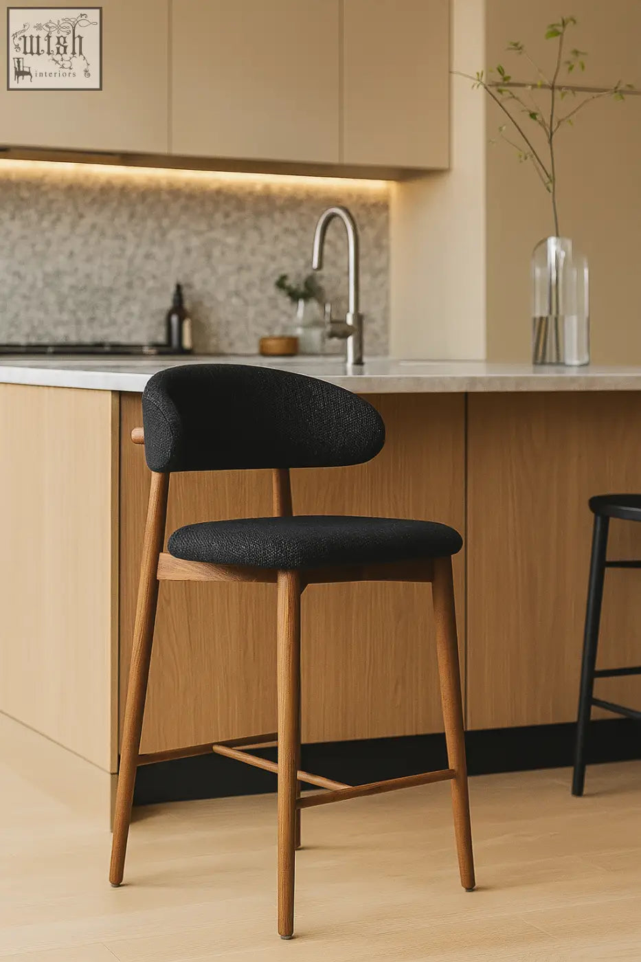 Black upholstered haruto bar stool with wooden legs and minimalist design perfect for modern bar seating