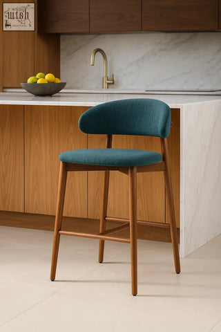 Teal upholstered haruto bar stool with wooden legs and sleek modern design perfect for kitchen or home bar seating