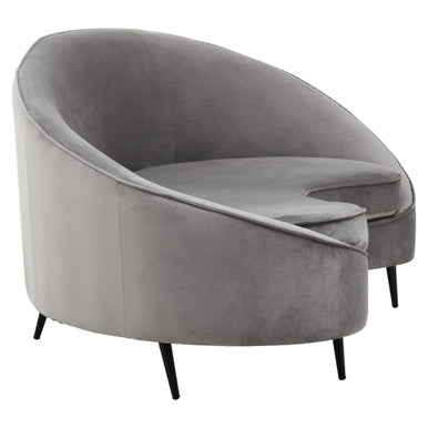 Gray velvet armchair with sleek curved design and black metal legs from hasina three seat grey velvet collection