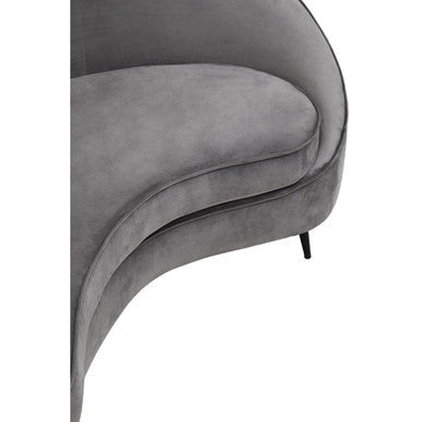 Hasina three seat grey velvet sofa with sleek curved design and thin black legs perfect for modern living rooms