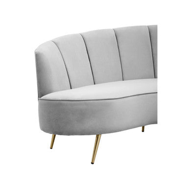 Hasna three seat grey velvet sofa with sleek curved back and gold tone legs in light grey velvet upholstery