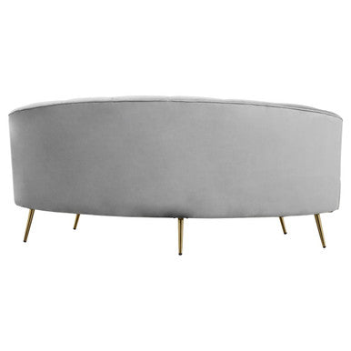 A sleek oval grey velvet coffee table with slender gold-tone legs paired with the hasna three seat grey velvet sofa