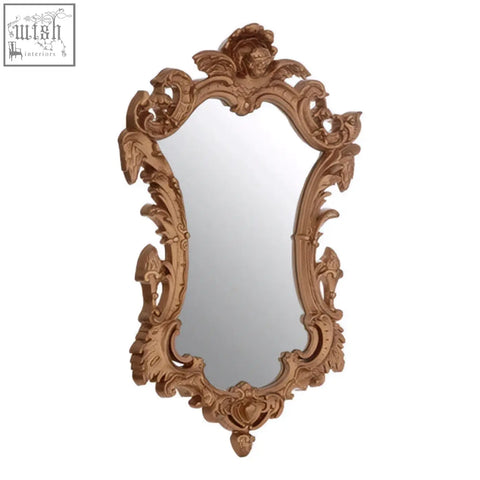 Antique gold finish wall mirror has intricate baroque carvings and a decorative crest perfect for elegant decor