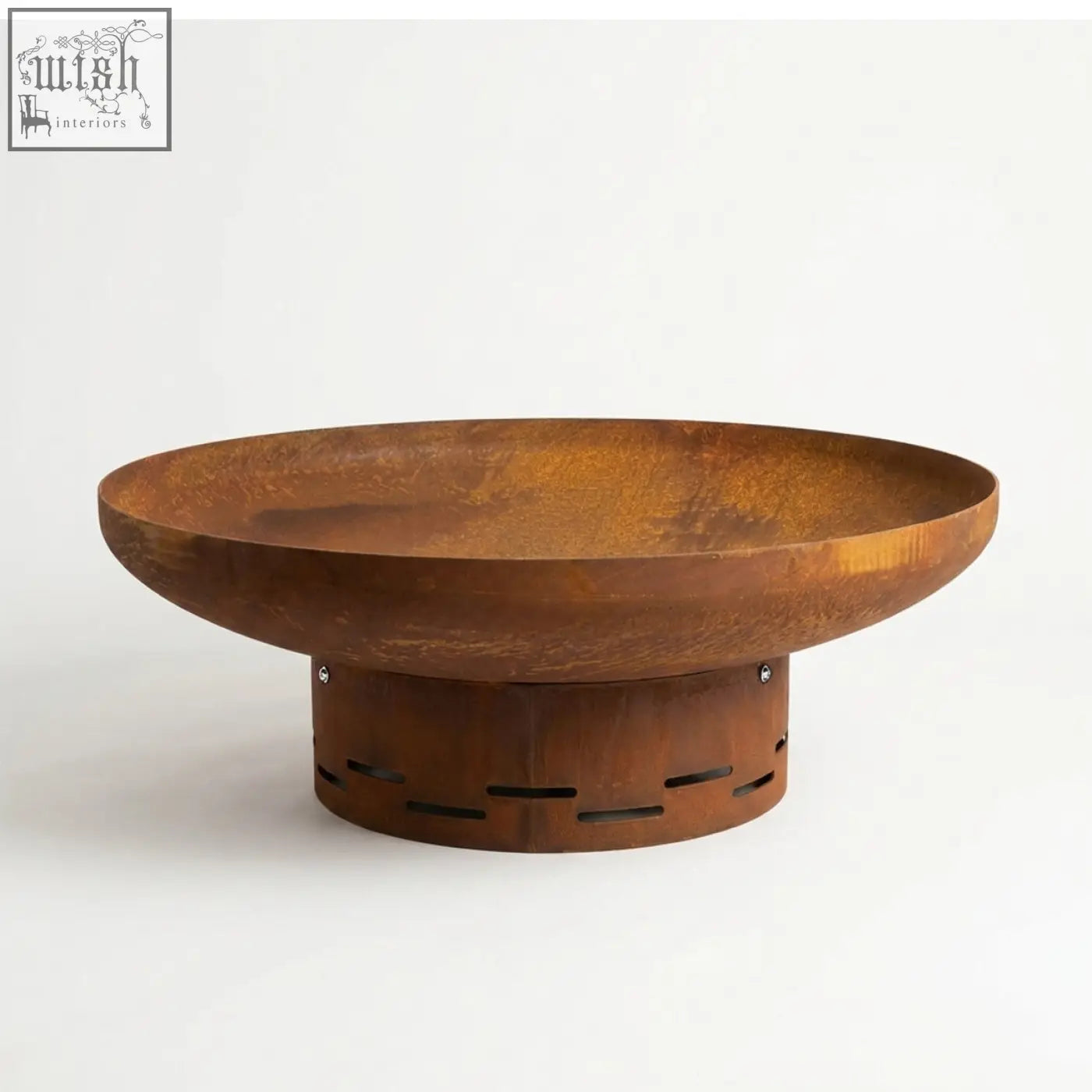 Rustic copper-colored nicoman heavy-duty pre-rusted corten steel firepit bowl with perforated base for outdoor use