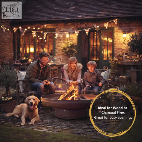 Rustic black nicoman heavy-duty pre-rusted corten steel firepit with wide shallow bowl and sturdy base for outdoors