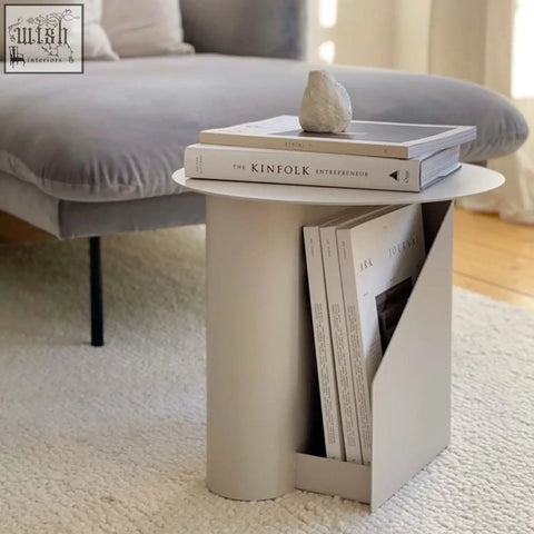 Minimalist off-white hector side table with book storage made of painted steel featuring a built-in magazine rack