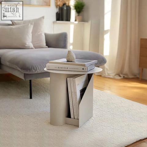 Minimalist off-white hector side table made of painted steel with book storage and a sleek modern cylindrical design