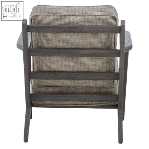 Gray tweed armchair with black oak wood frame and armrests featuring a dark gray woven fabric seat and backrest