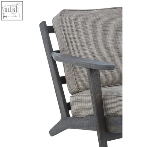 Gray textured tweed armchair with black oak wood frame and dark gray wooden legs for stylish living spaces