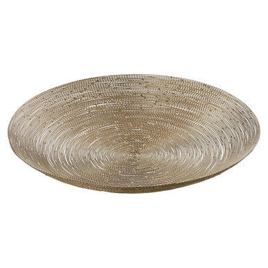 Beige woven placemat with concentric circles under hege nickel twisted wire decorative plate for stylish table decor