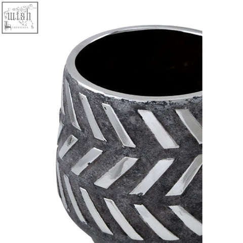 Dark gray ceramic silver small planter with textured surface metallic rim and geometric cut-out pattern