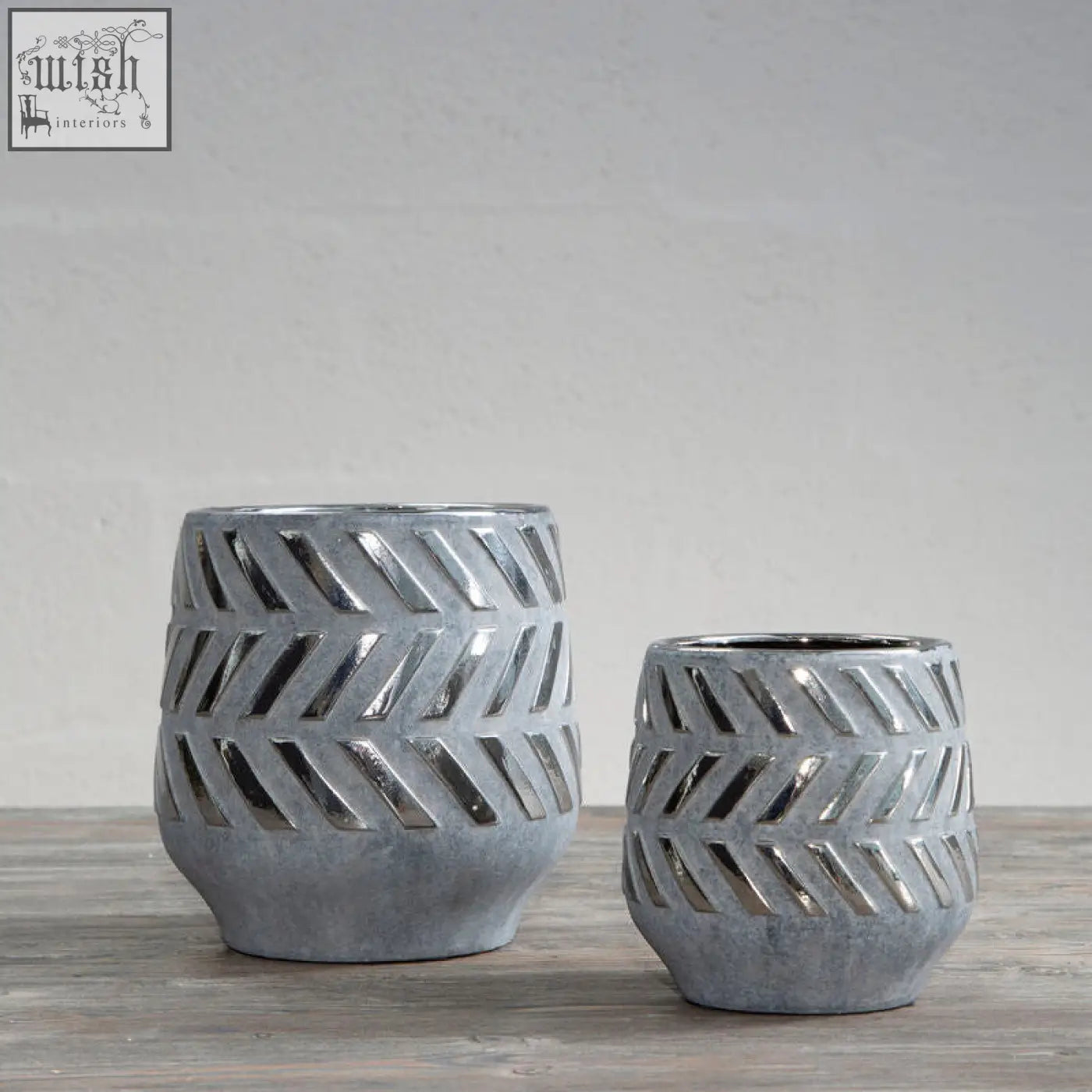 Helaine grey and silver small planter features gray ceramic with matte texture and silver small planter chevron patterns
